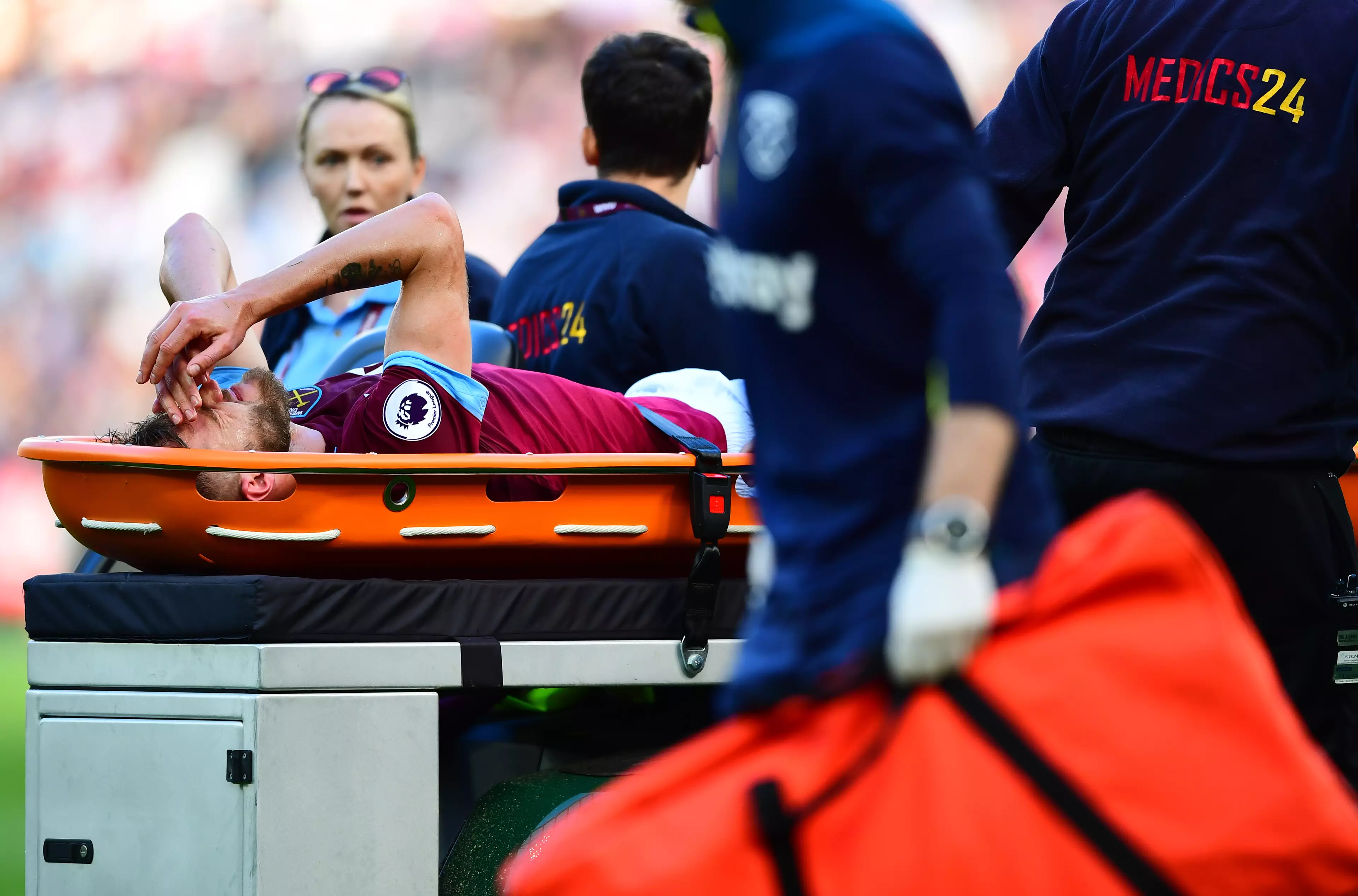 Yarmolenko being stretchered off. Image: PA Images