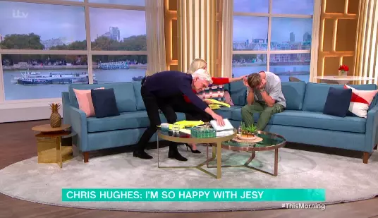 Chris put his head in his hands as he spoke about Jesy's strength (