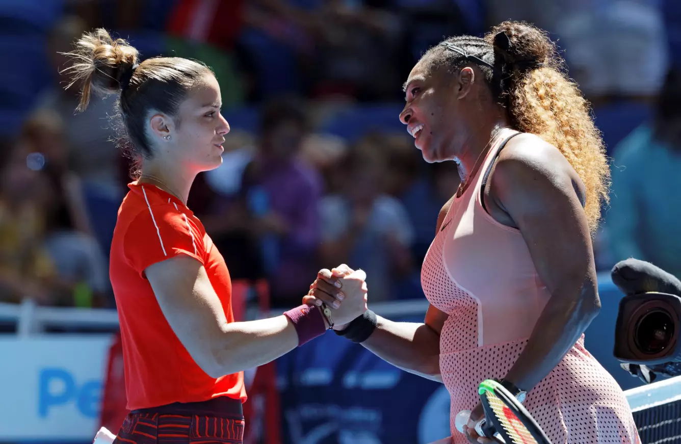 Serena Williams shakes hands with Maria Sakkari of Greece after winning their match at the Hopman Cup.