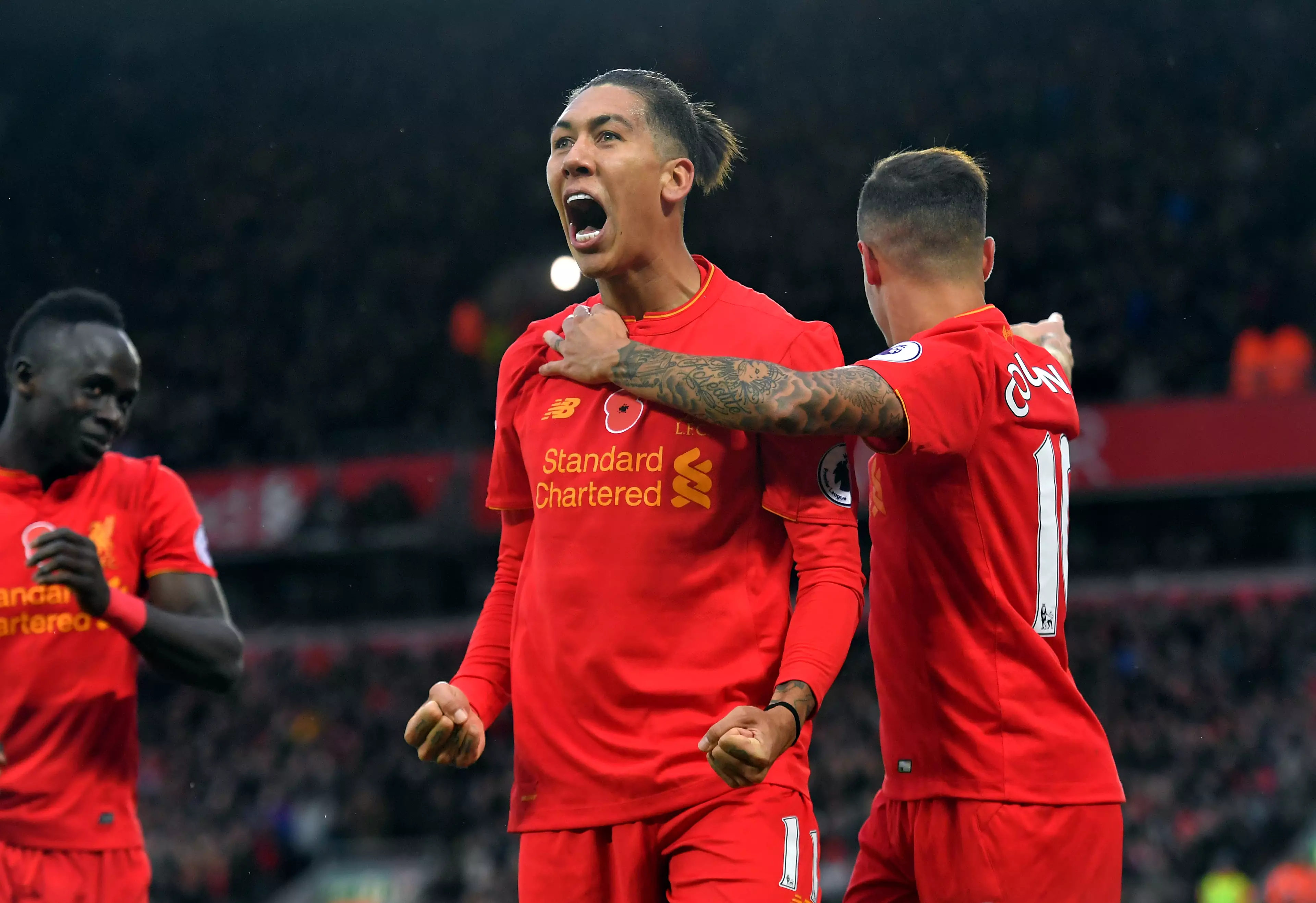 Coutinho and Firmino celebrate. (Image
