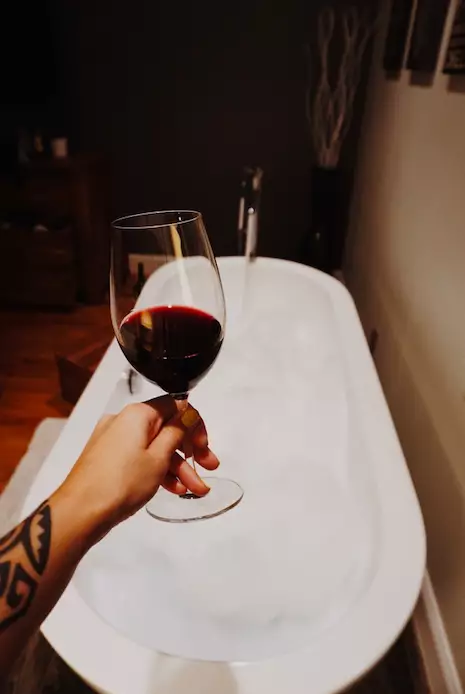 Swapping a night out for a bath and a bottle of red sounds appealing (