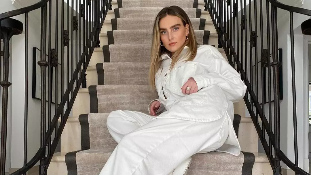 People Spot 'Cleaner' Standing At Top Of Perrie Edwards' Photo