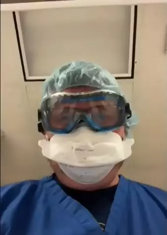 The doctor shared a video of himself staring down at a hospital bed (