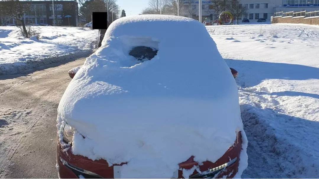 Police Catch Man Driving Snow Covered Car With 'Practically Zero Visibility'