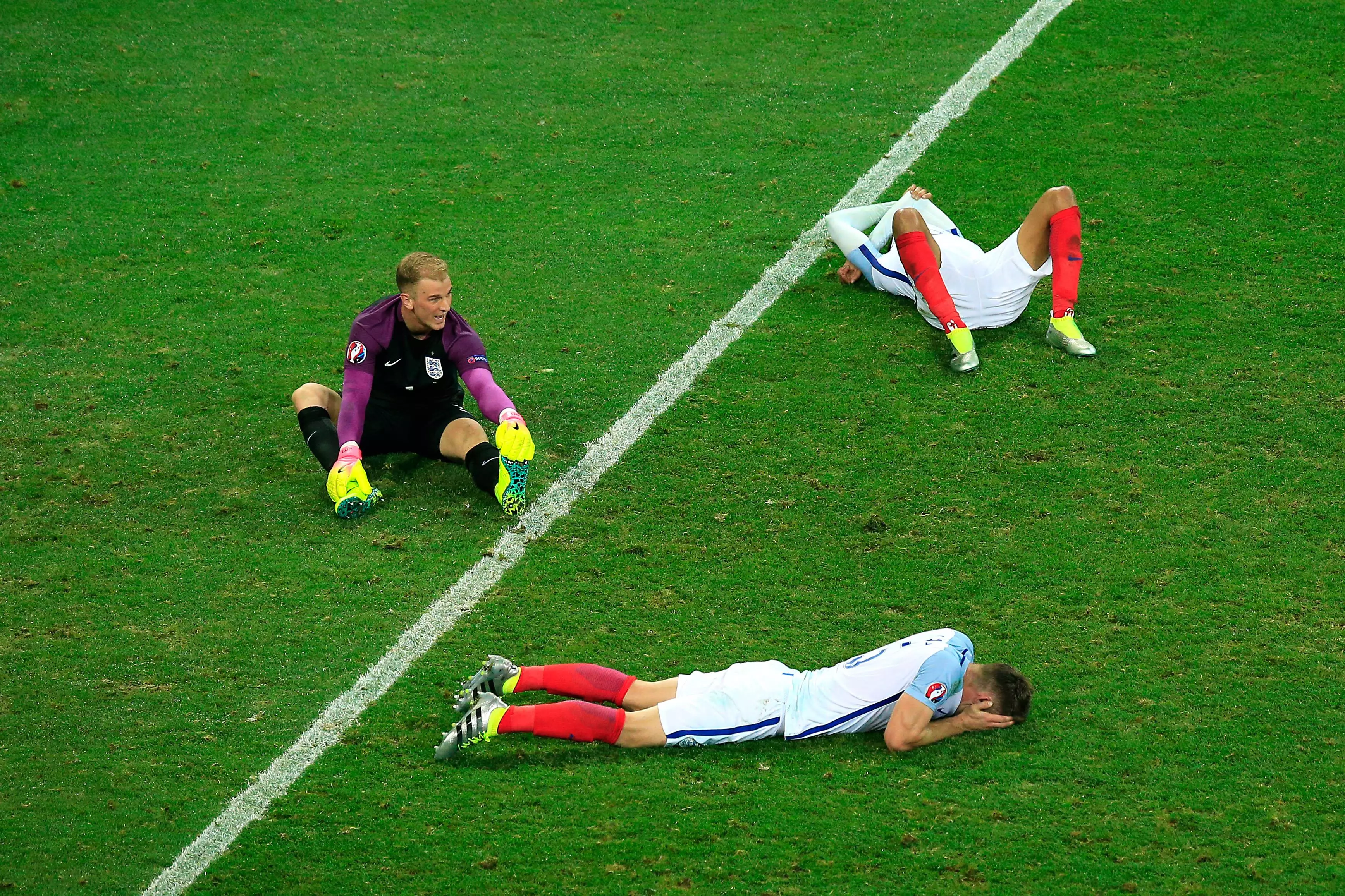 Cahill, Joe Hart and Dele Alli after the Iceland disaster. Image: PA Images.
