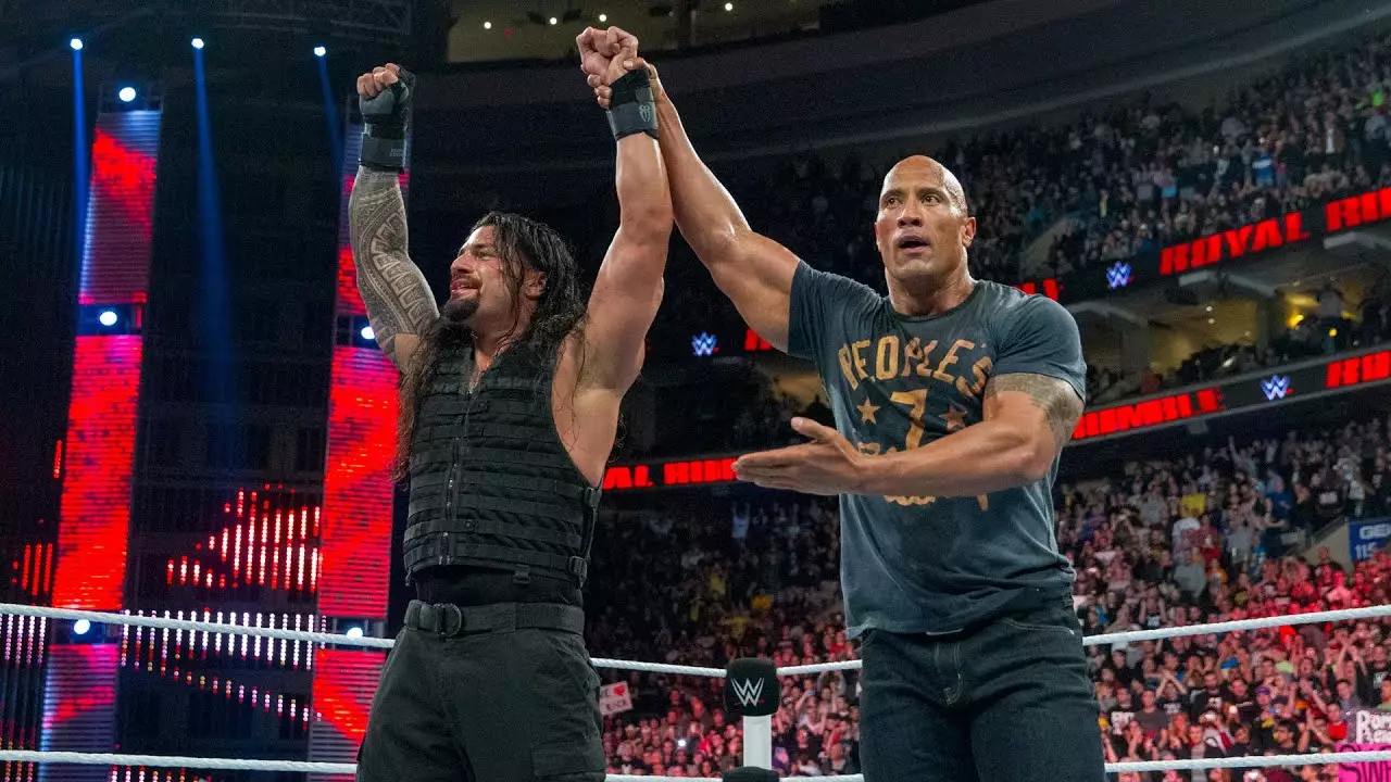Roman Reigns and The Rock.