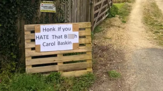 Couple Forced To Take Down 'Honk If You Hate That B***h Carole Baskin Sign'