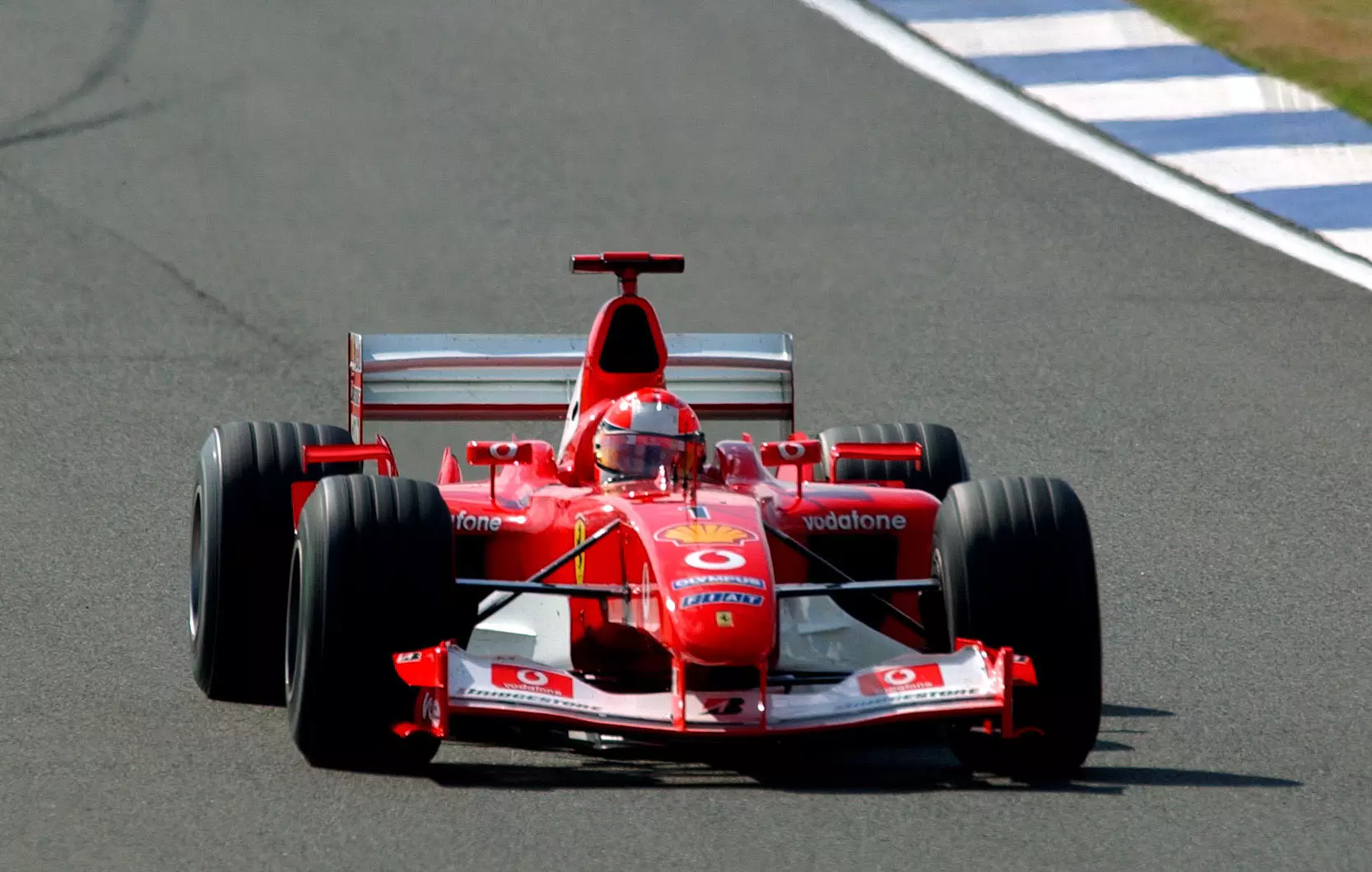 Between 2000 and 2004 he won five championships while driving for Ferrari.