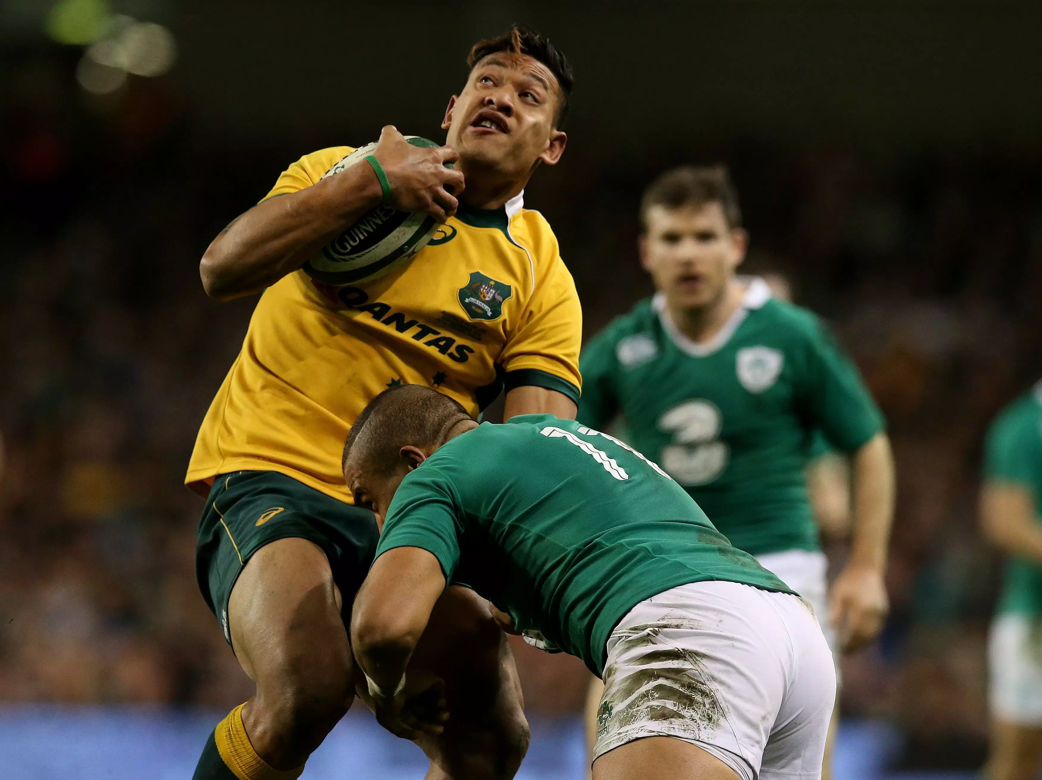 Ireland's Simon Zebo tackles Australia's Israel Folau in 2014.