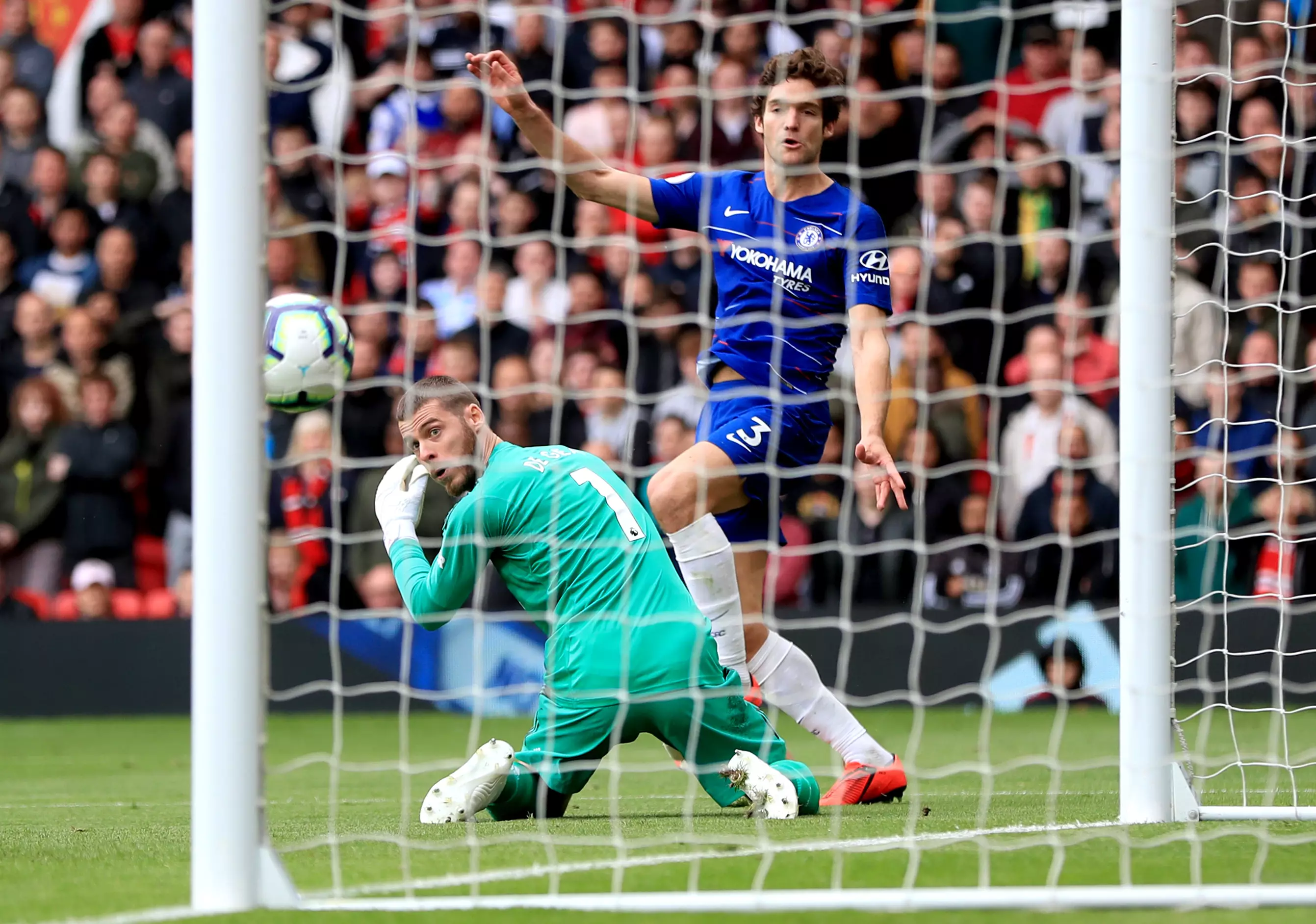 De Gea watches Marco Alonso captialise on his mistake in United's 1-1 draw against Chelsea. (Image