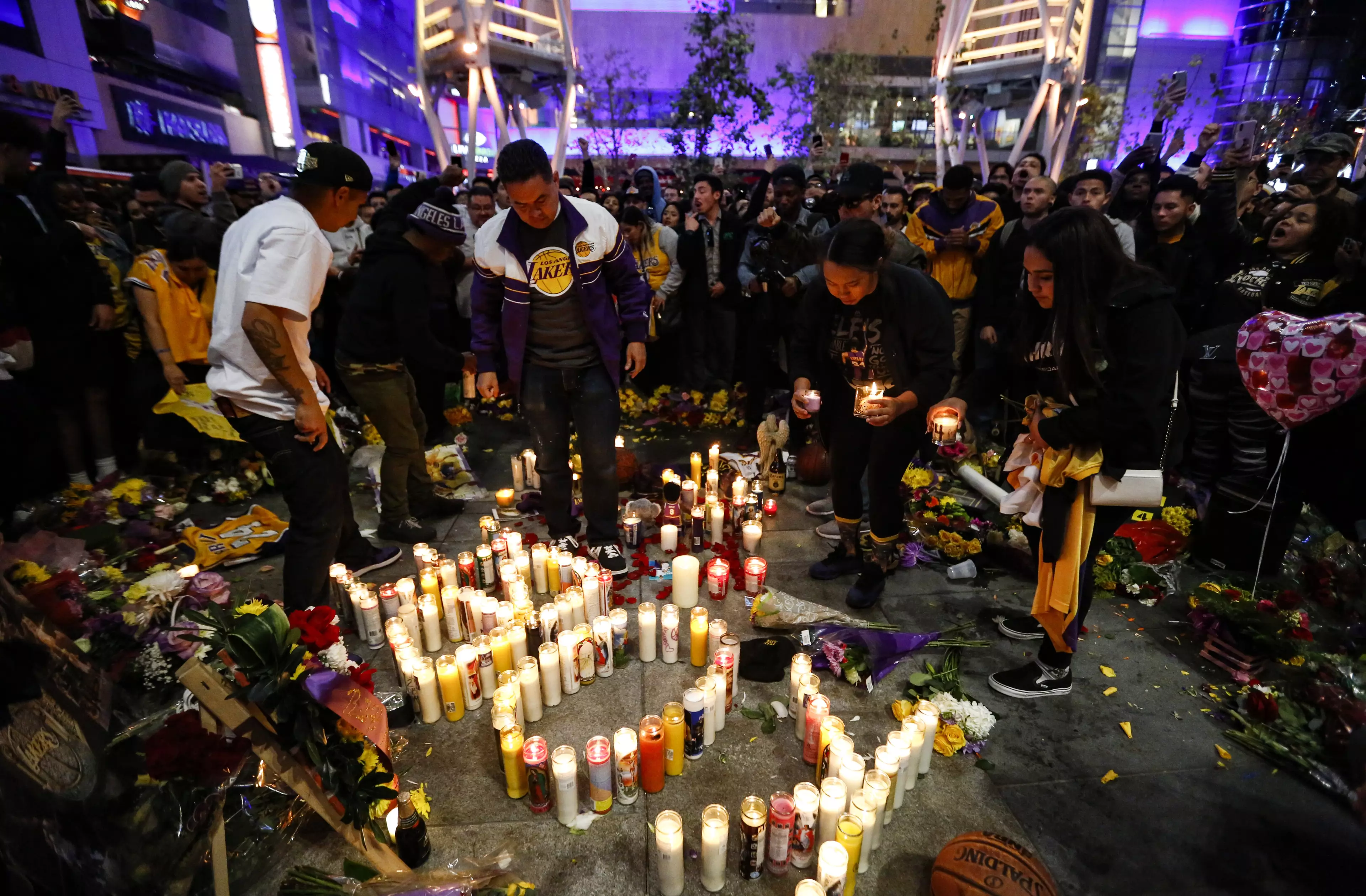 Fans pay tribute to Kobe outside of the Staples Centre. Image: PA Images