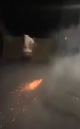 He chucked the firework on to the floor.