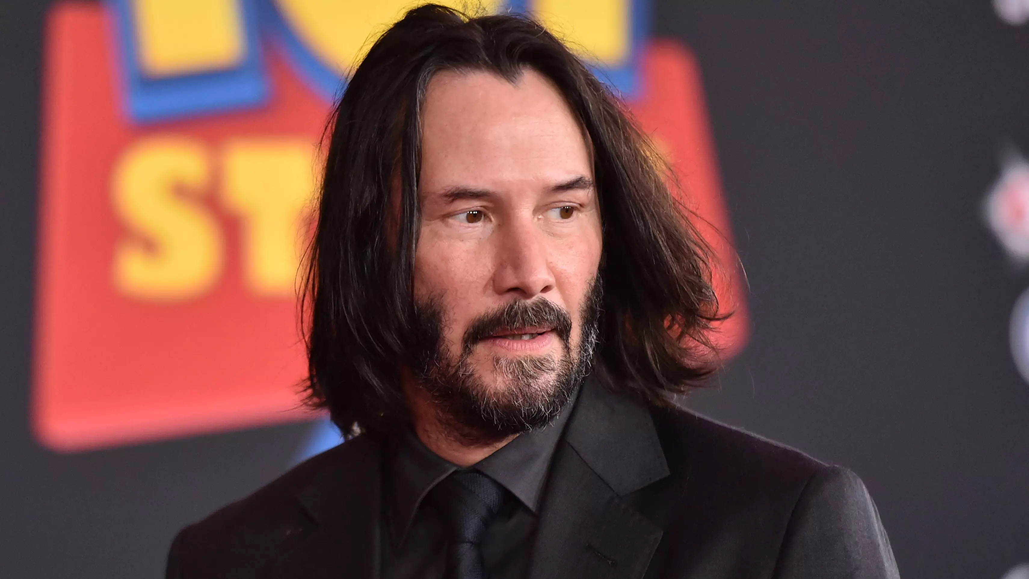 Keanu Reeves Autographs Fan's Sign On Way To Bill And Ted Set