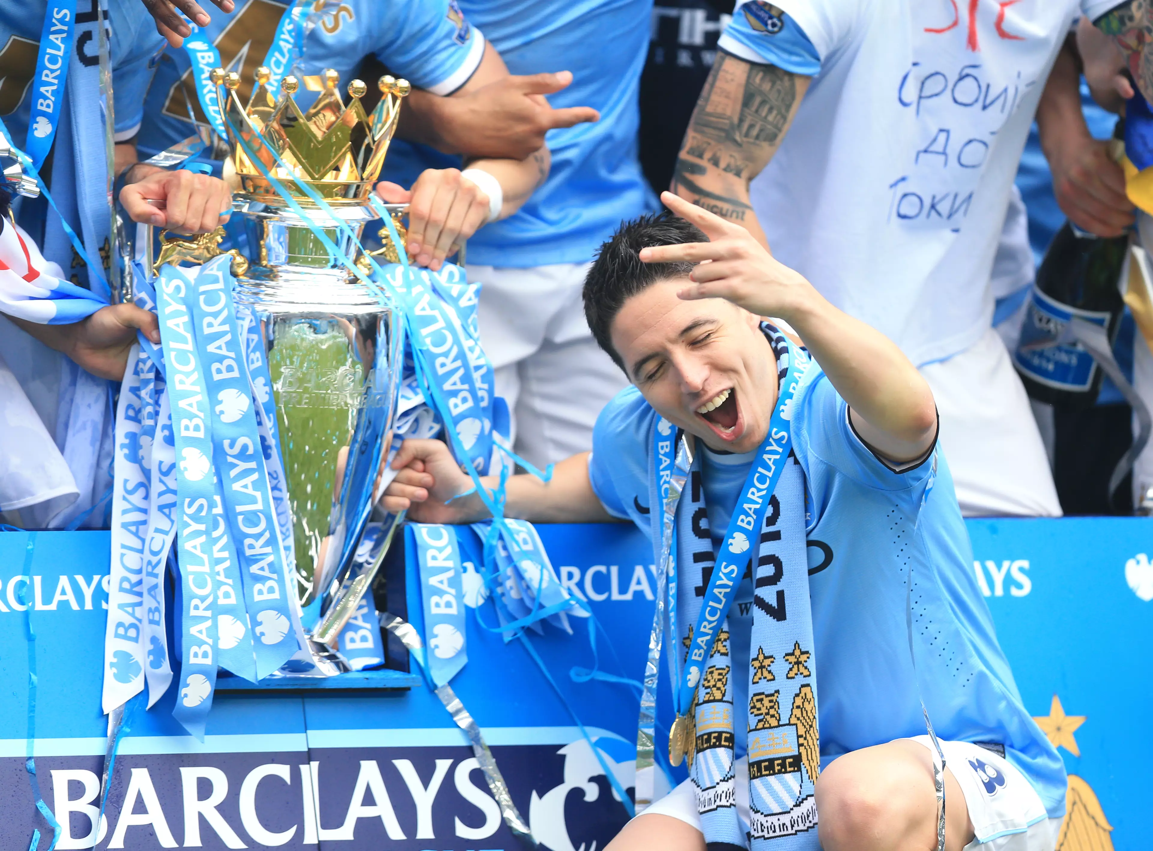 Nasri celebrating with the Premier League trophy. Image: PA Images