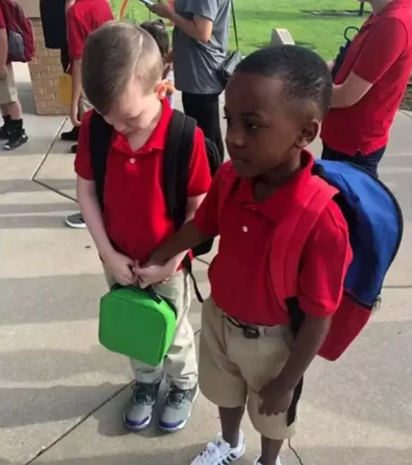 Christian saw Connor crying on their first day of school and rushed over to hold his hand.