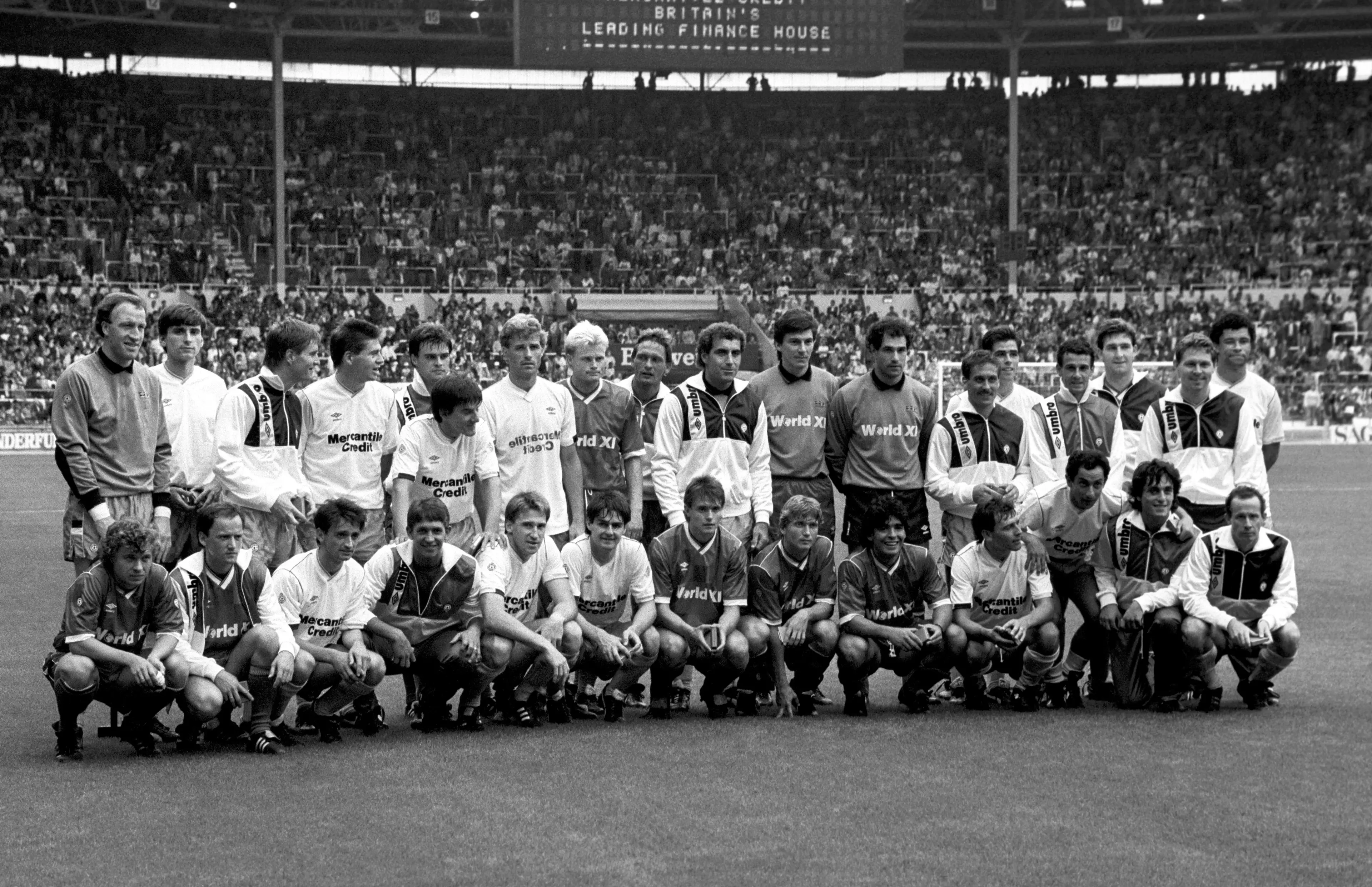 The two sides pose ahead of the Football League Centenary Match at Wembley Stadium. Maradona is pictured in the bottom row towards the right.