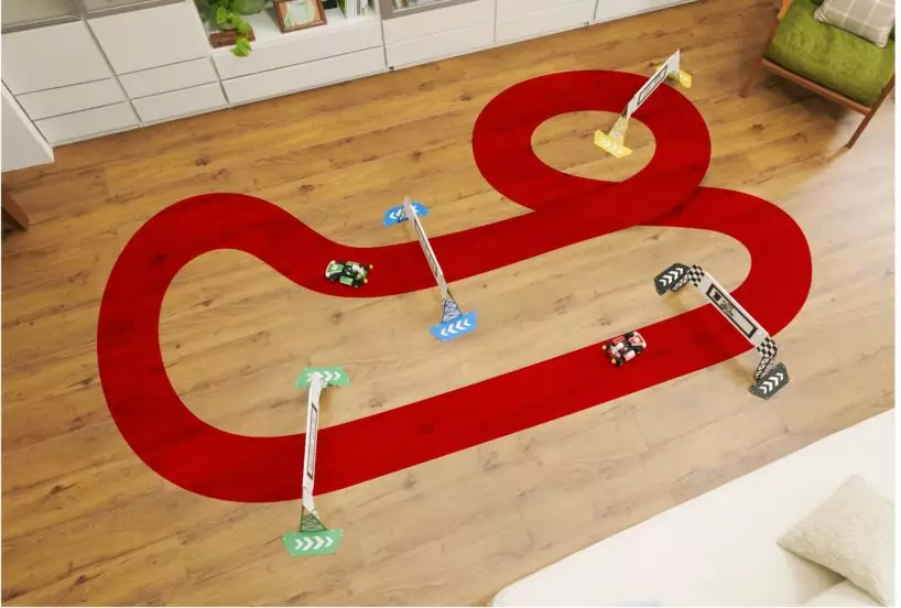 To get started, you need to set up a physical track in your home using the gates provided (