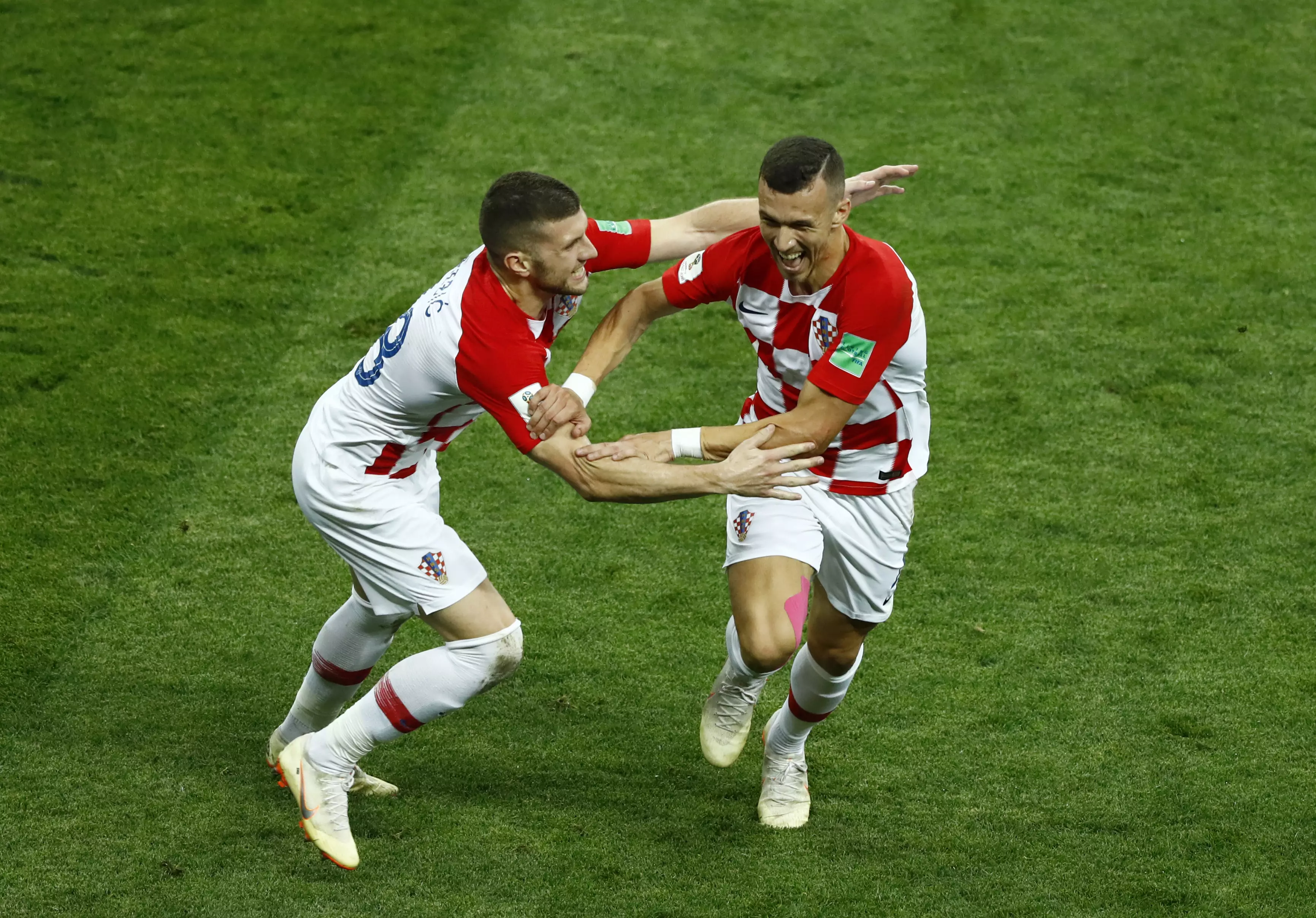 Perisic and Rebic celebrate Croatia equalising in the World Cup final. Image: PA Images