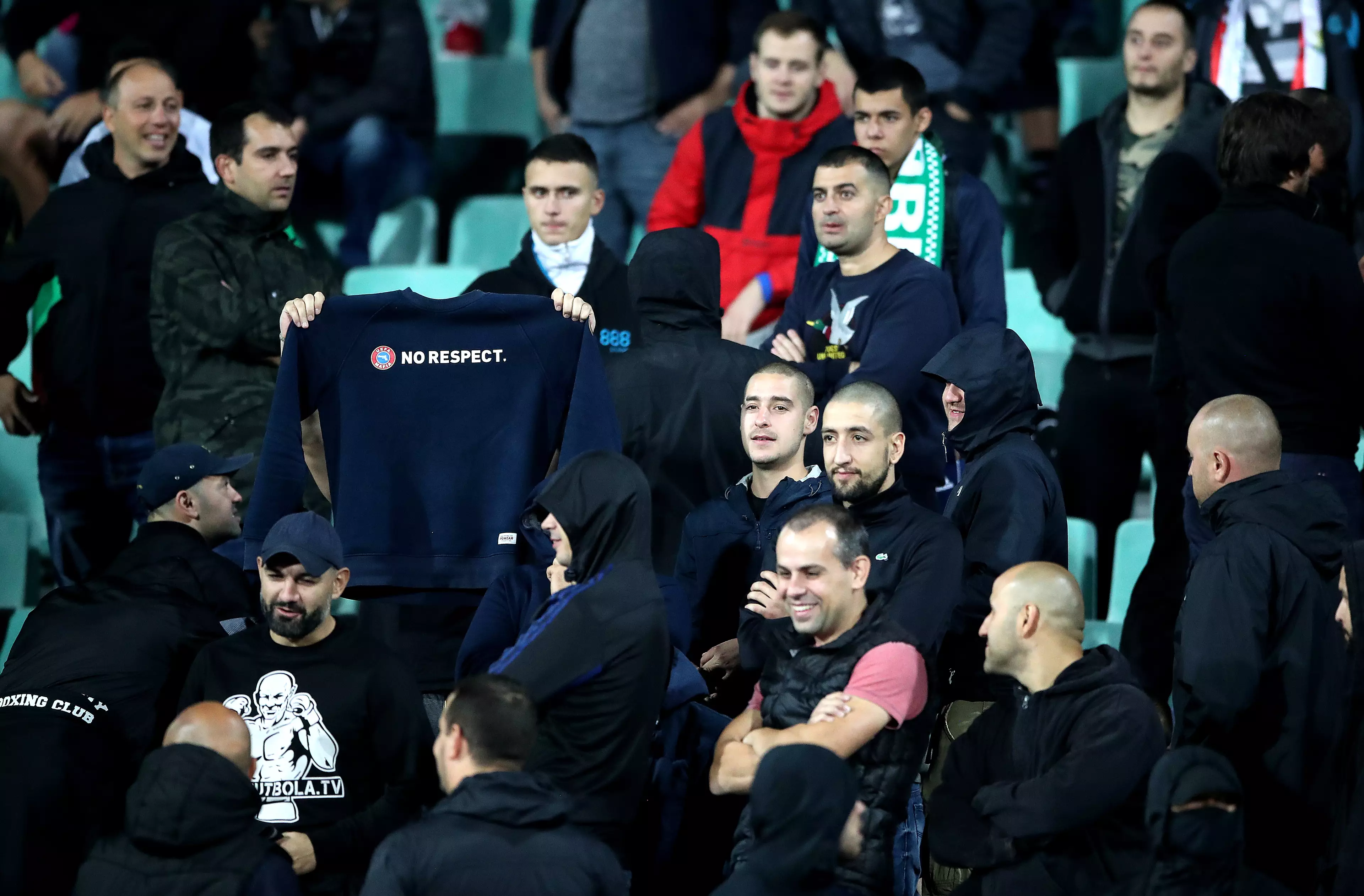 Bulgaria fan holds up a shirt saying 'No Respect.' Image: PA Images
