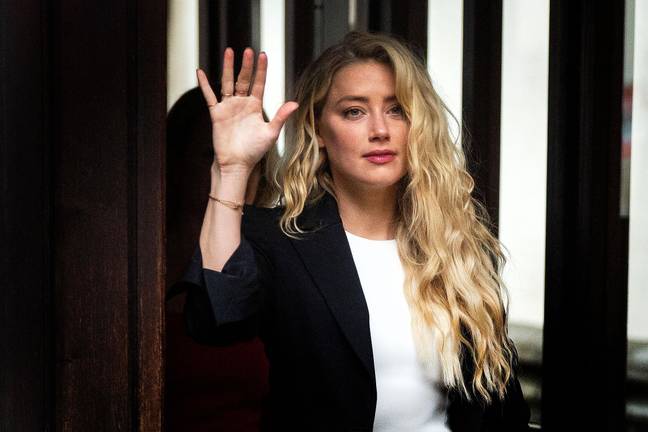 Amber Heard已向约翰尼·德普（Johnny Depp）支付了100万美元的诽谤审判和解。学分：PA图像 / Alamy Stock Photo