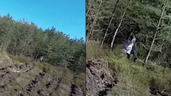严重令人毛骨悚然的无人机镜头捕获了“黑眼睛的女孩”，穿过Cannock Chase Forest
