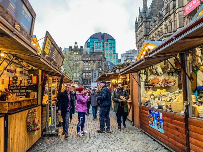 曼彻斯特圣诞节市场是欧洲最大的。学分：薄荷摄影/Stockimo/Alamy Stock Photo