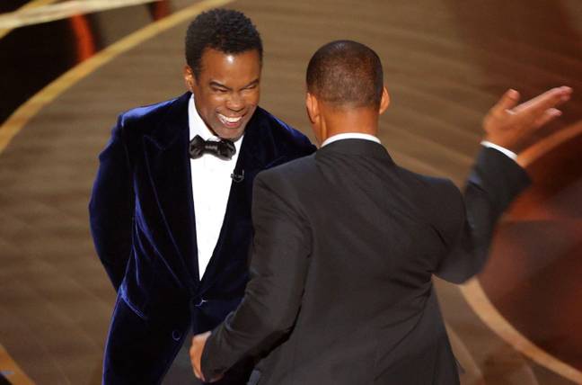 威尔·史密斯（Will Smith）在奥斯卡颁奖典礼上拍了克里斯·洛克（Chris Rock）。图片来源：Alamy
