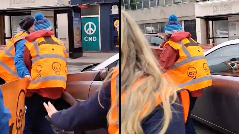 驾驶员公羊通过停止石油抗议并在令人震惊的镜头中“跑去女人”“loading=