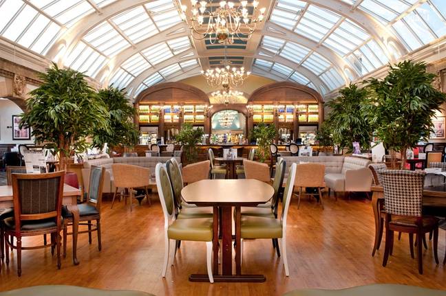 The pub has a glass domed-ceiling, chandeliers and Grecian columns. Credit: Wetherspoons