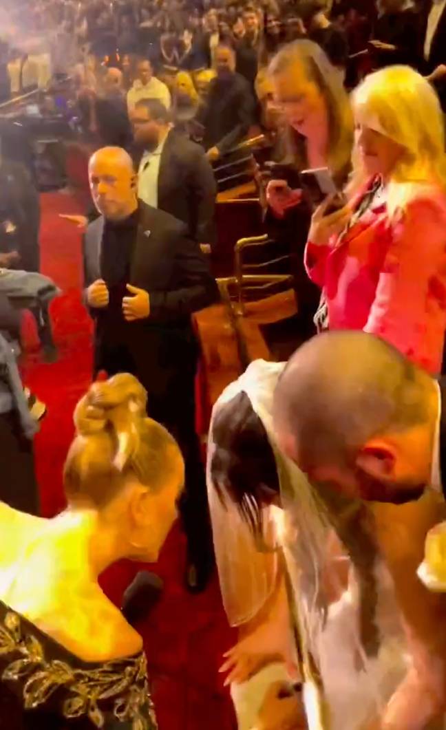 Adele signed wedding dress of couple who just got married while singing ...