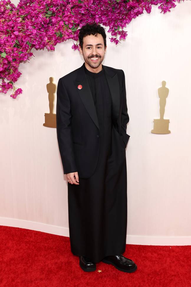 Poor Things' Ramy Youssef wearing a pin. Credit: Marleen Moise/Getty Images