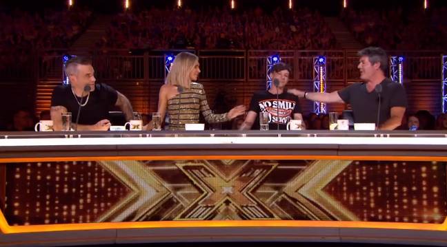 Louis Tomlinson hugs Anthony Russell during X Factor rehearsal after he  fell ill before semi-finals
