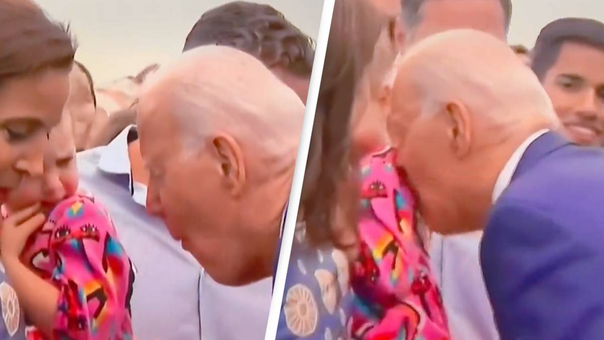 Joe Biden pretends to gobble up little girl before sniffing her in(01)
