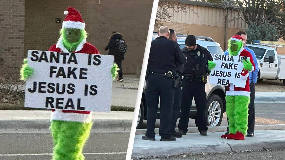Grinch stands outside elementary school scaring children with ‘Santa is Fake’ sign