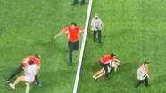 People Divided After Female Pitch Invader Brutally Tackled By Security During At Football Game
