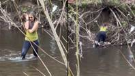 Woman wades 60 miles through river to track down missing dog with AirTag