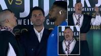 Oleksandr Usyk bursts into song after tense face-off with Anthony Joshua ahead of their rematch
