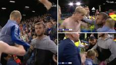 The incredible moment Everton fan forgets he has a son while trying to hug Anthony Gordon