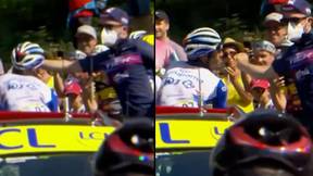Tour De France Rider Wiped Out After Rival Trainer Whacks Him In Face