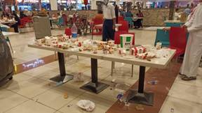 Customers Furious After Family Leave Behind Entire Table Of Rubbish At KFC