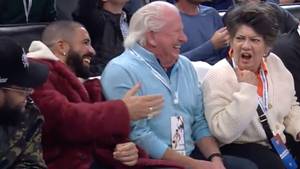 Elderly Couple At Basketball Game Seem Unaware They're Next To Drake