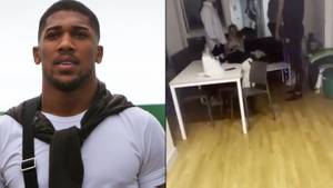 人们分裂了安东尼·约书亚（Anthony Joshua）威胁要破解学生下巴的视频