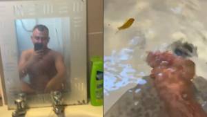 Bloke Gets Into Bath With Fish After Being Asked To Clean Out Tank By Mum