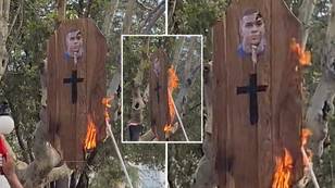 Argentina fans burn coffin with Kylian Mbappe’s face on at World Cup trophy parade