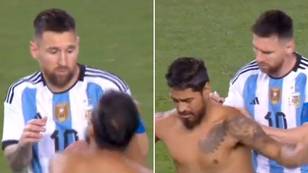 Pitch invader attempts to get Lionel Messi's autograph on his back, it really didn't go to plan
