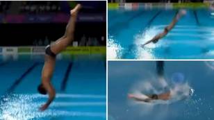 Stomach-churning moment diver misjudges jump and face-plants, belly-flops straight into water