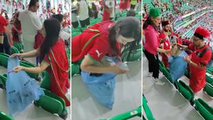 Morocco fans stay behind to clean stadium after historic World Cup win over Belgium