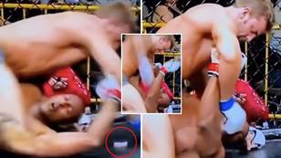 Incredible moment MMA fighter gives mouthpiece back to opponent before beating the hell out of him