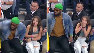 Young fan's shocked reaction to sitting next to LeBron James is incredibly wholesome