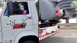 Man Dressed As The Joker Seen Towing Away The Batmobile